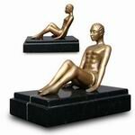 Bookends with Art Deco Style Art on marble base with Gold Colored man by Decomoments called Endurance